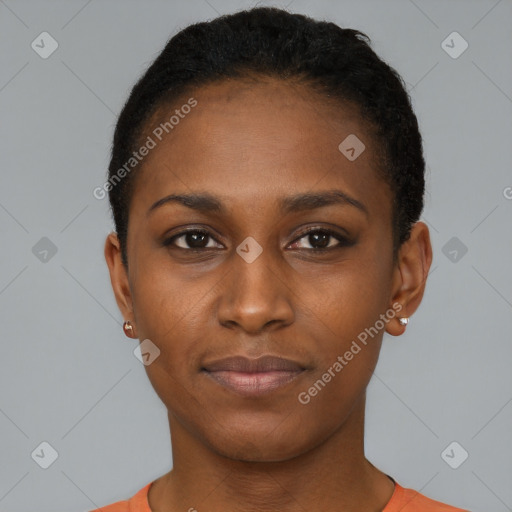 Joyful black young-adult female with short  black hair and brown eyes