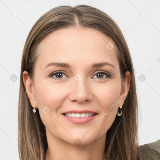 Joyful white young-adult female with long  brown hair and grey eyes