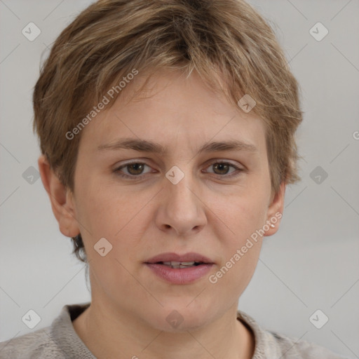 Joyful white young-adult female with short  brown hair and grey eyes