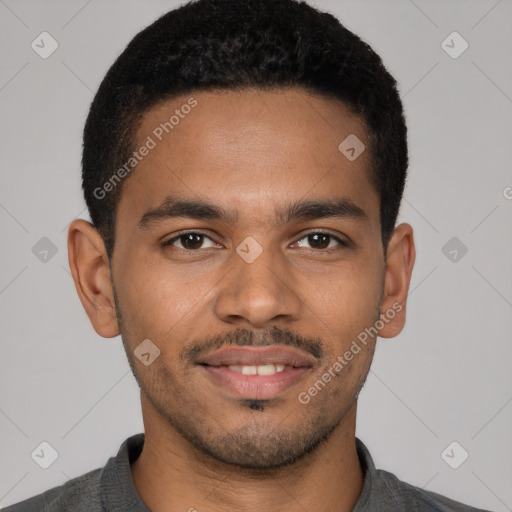 Joyful latino young-adult male with short  brown hair and brown eyes