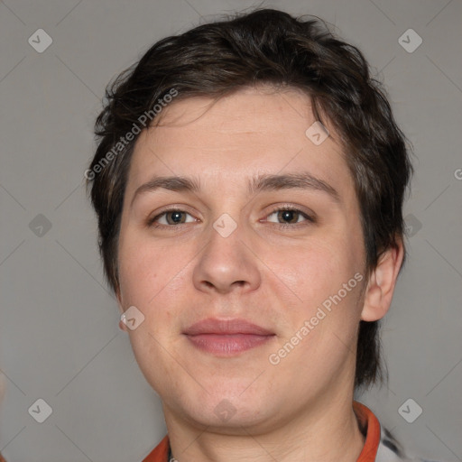 Joyful white adult male with short  brown hair and brown eyes