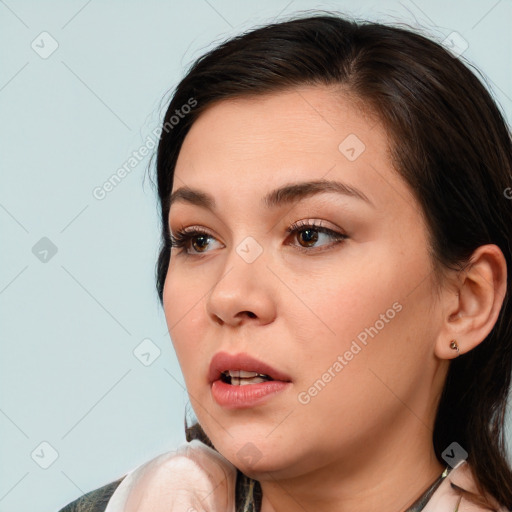 Neutral white young-adult female with medium  brown hair and brown eyes