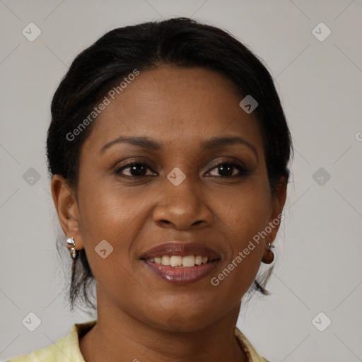 Joyful black young-adult female with medium  brown hair and brown eyes