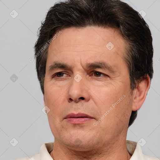 Neutral white adult male with short  brown hair and brown eyes