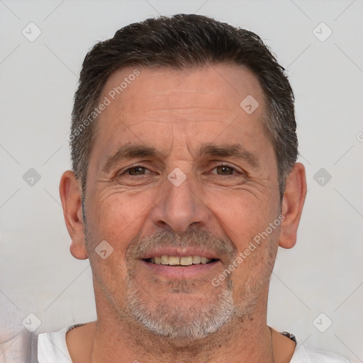 Joyful white middle-aged male with short  brown hair and brown eyes