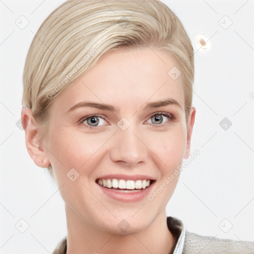 Joyful white young-adult female with short  brown hair and blue eyes