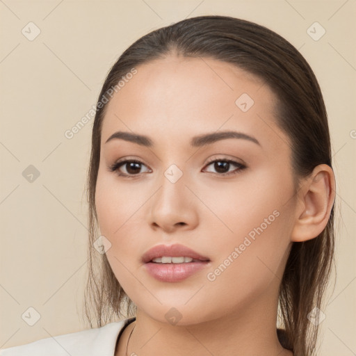 Neutral white young-adult female with long  brown hair and brown eyes