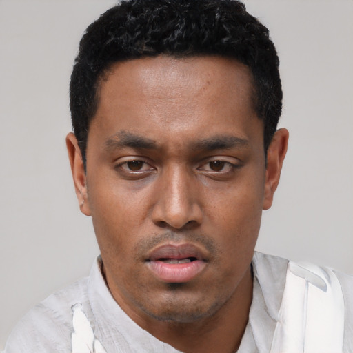 Neutral black young-adult male with short  black hair and brown eyes