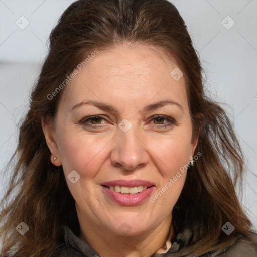 Joyful white adult female with long  brown hair and brown eyes