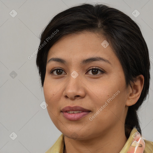 Joyful asian young-adult female with medium  brown hair and brown eyes