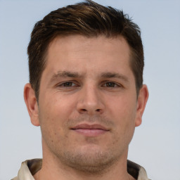 Neutral white young-adult male with short  brown hair and brown eyes