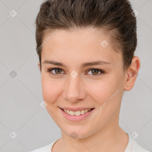 Joyful white young-adult female with short  brown hair and brown eyes