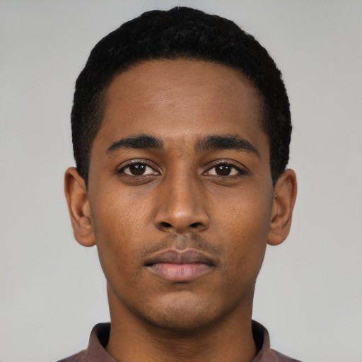 Neutral black young-adult male with short  black hair and brown eyes
