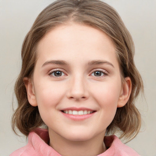 Joyful white child female with medium  brown hair and grey eyes