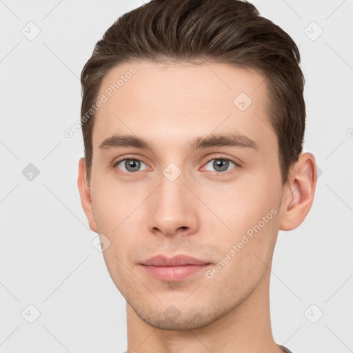 Neutral white young-adult male with short  brown hair and brown eyes