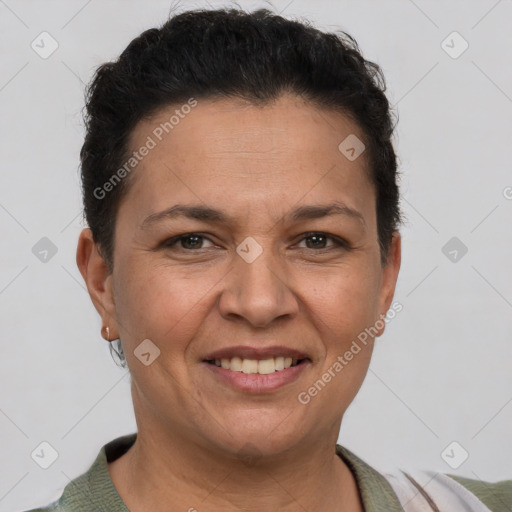 Joyful white adult female with short  brown hair and brown eyes