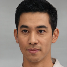 Neutral asian young-adult male with short  black hair and brown eyes