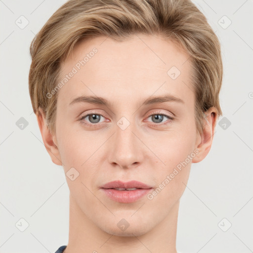 Joyful white young-adult female with short  brown hair and grey eyes