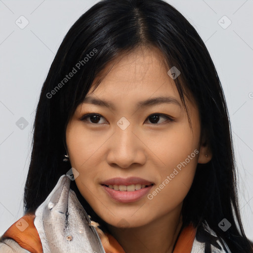 Joyful asian young-adult female with long  black hair and brown eyes
