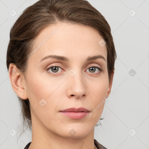 Neutral white young-adult female with medium  brown hair and grey eyes