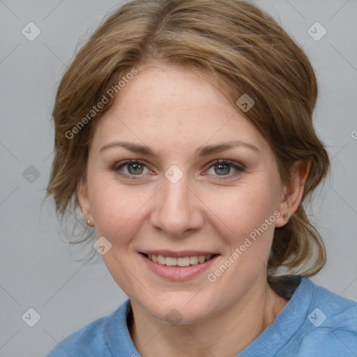 Joyful white young-adult female with medium  brown hair and blue eyes