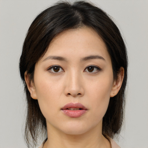 Neutral asian young-adult female with medium  brown hair and brown eyes