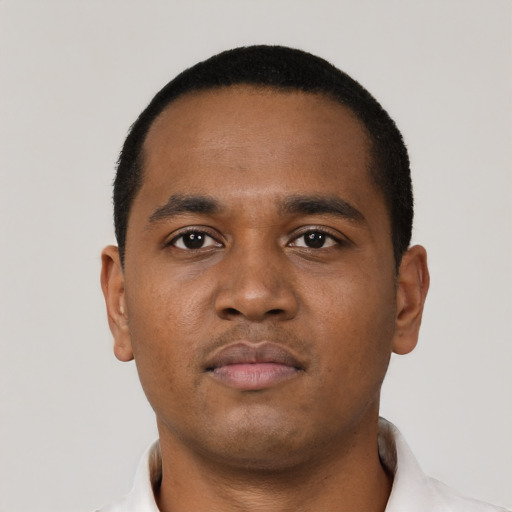 Neutral black young-adult male with short  black hair and brown eyes