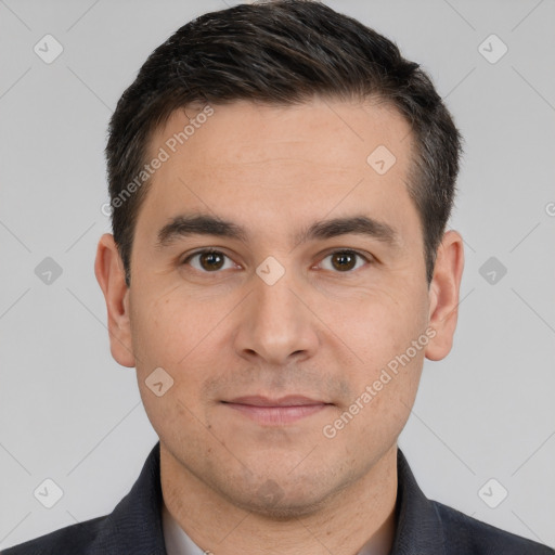 Joyful white adult male with short  brown hair and brown eyes