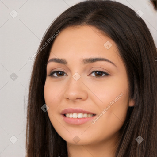 Joyful white young-adult female with long  brown hair and brown eyes