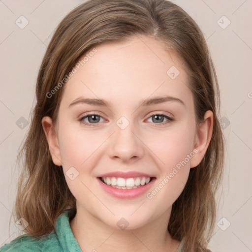 Joyful white young-adult female with medium  brown hair and blue eyes