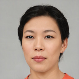 Neutral asian young-adult female with short  black hair and brown eyes