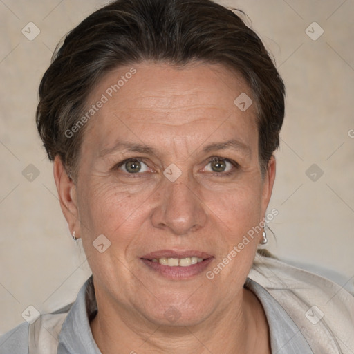 Joyful white adult female with short  brown hair and brown eyes