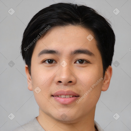 Joyful asian young-adult male with short  black hair and brown eyes