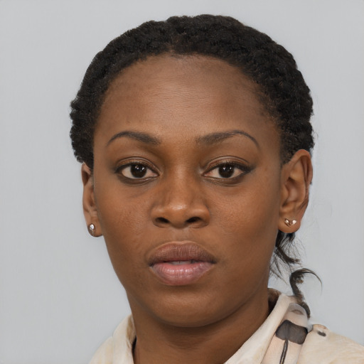 Neutral black young-adult female with short  brown hair and brown eyes