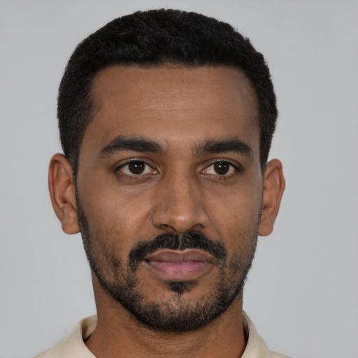 Neutral black young-adult male with short  black hair and brown eyes