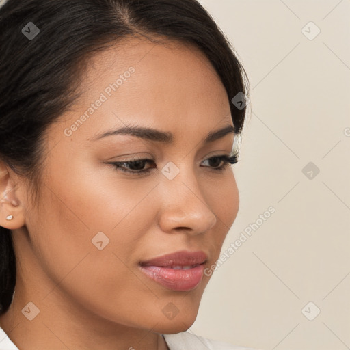 Joyful latino young-adult female with long  brown hair and brown eyes