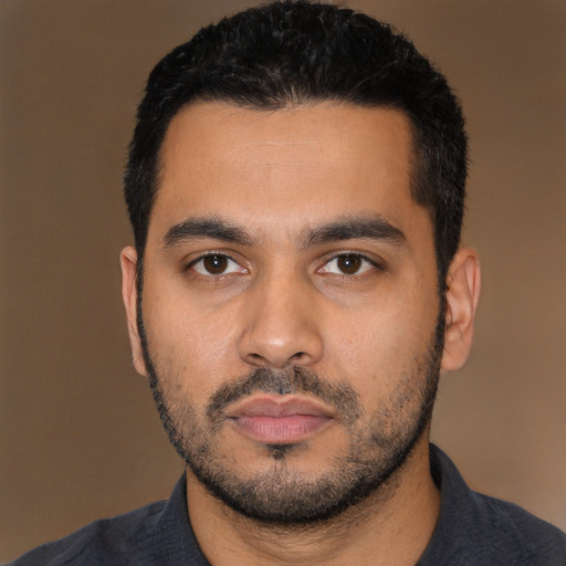 Neutral latino young-adult male with short  black hair and brown eyes