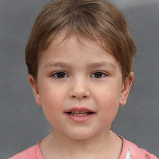 Joyful white child female with short  brown hair and brown eyes