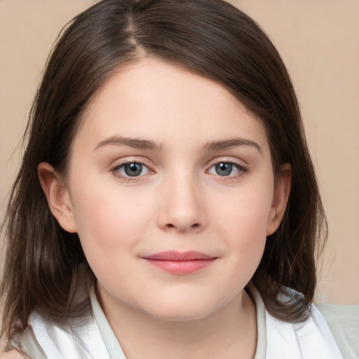 Joyful white child female with medium  brown hair and brown eyes