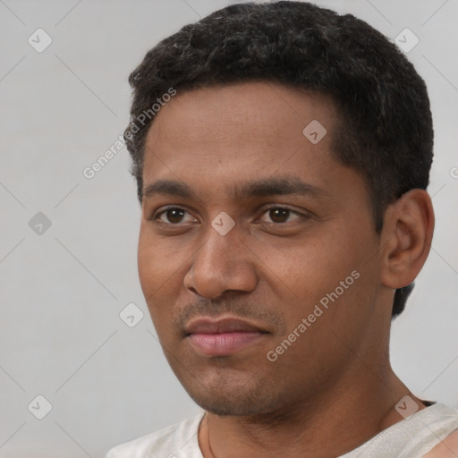 Neutral black young-adult male with short  black hair and brown eyes