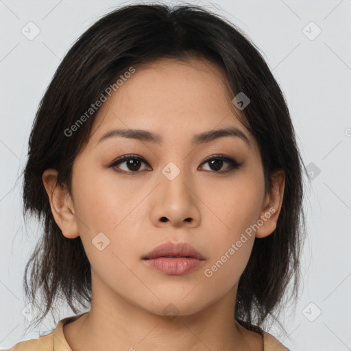 Neutral asian young-adult female with medium  brown hair and brown eyes