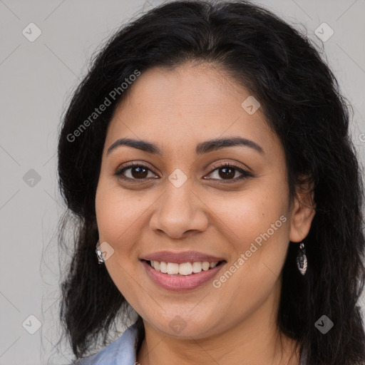 Joyful latino young-adult female with long  brown hair and brown eyes