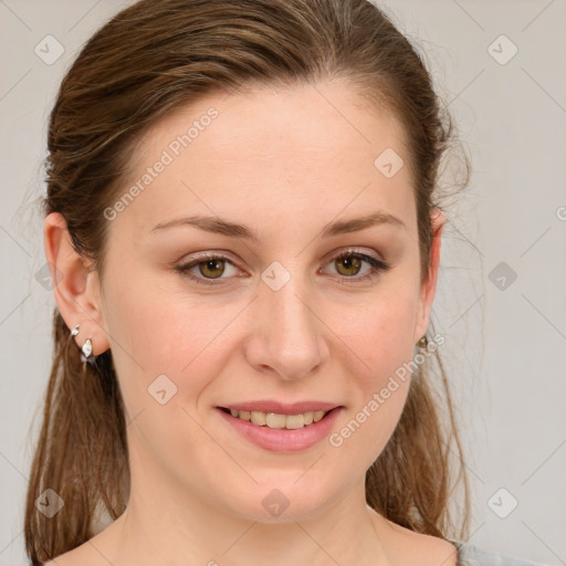 Joyful white young-adult female with medium  brown hair and green eyes