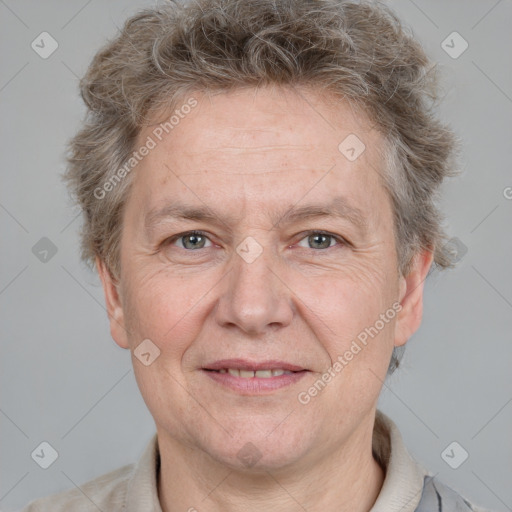 Joyful white middle-aged male with short  brown hair and grey eyes