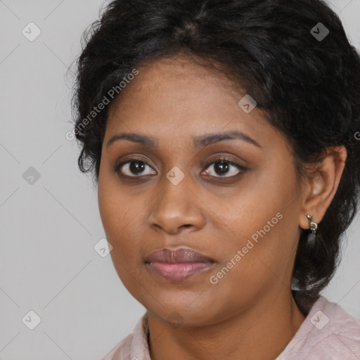 Joyful black young-adult female with medium  brown hair and brown eyes