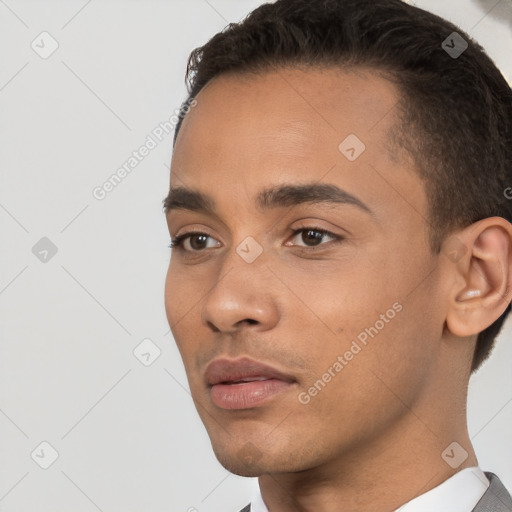 Neutral white young-adult male with short  black hair and brown eyes