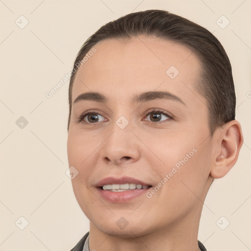 Joyful white young-adult female with short  brown hair and brown eyes