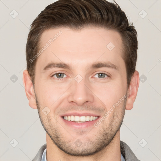 Joyful white young-adult male with short  brown hair and brown eyes