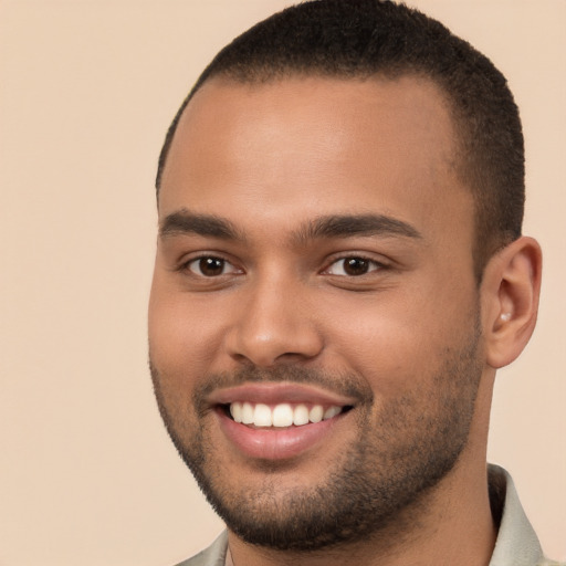 Joyful white young-adult male with short  brown hair and brown eyes