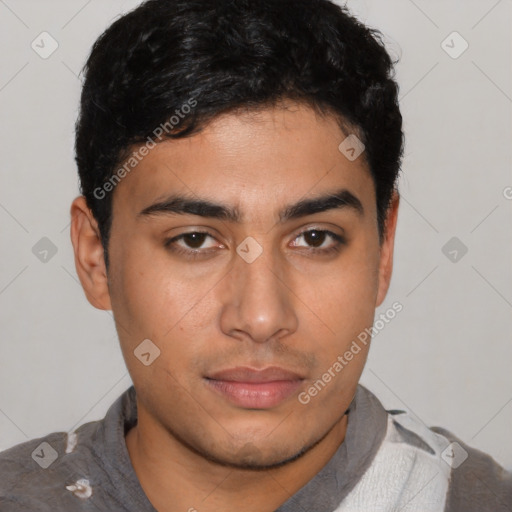 Neutral latino young-adult male with short  black hair and brown eyes